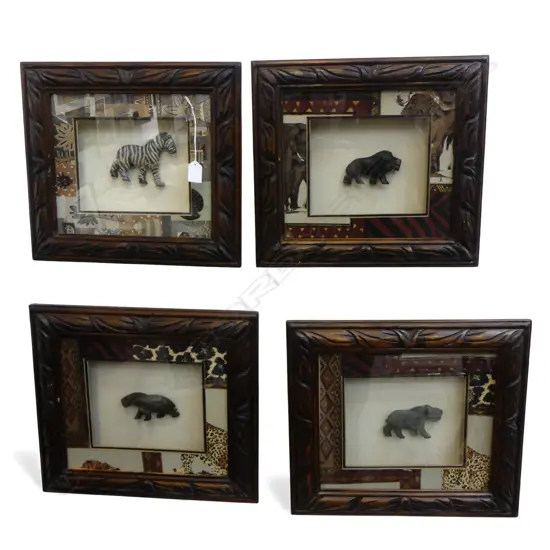 FOUR CARVED STONE AFRICAN ANIMALS HOUSED IN HAND CARVED FRAMES 350 X 400 mm (OVERALL EACH)