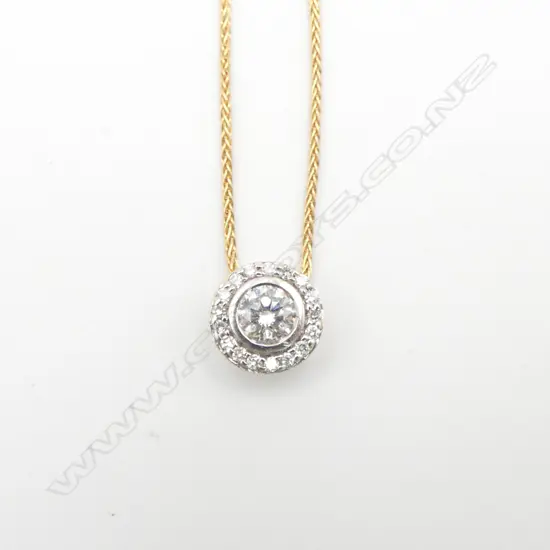Designer 0.45ct DIAMOND SOLITAIRE PENDANT w diamond halo surround on 18ct GOLD CHAIN. Push button length adjust.8.2gms