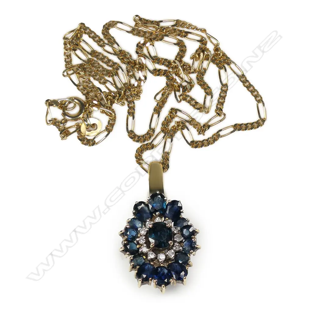A 14ct gold and sapphire pendant, Image 1++