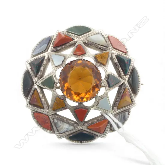 A c.1900 Scottish silver agate and yellow gem brooch,