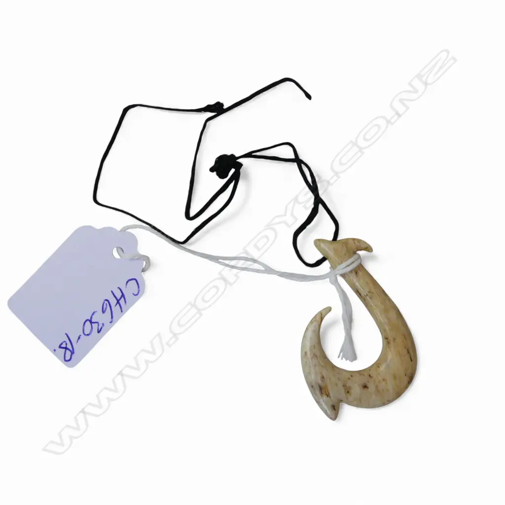 DAVID TUART CARVED WHALE BONE HEI MATAU pendant of good form & polish. L.46mm Image 1++