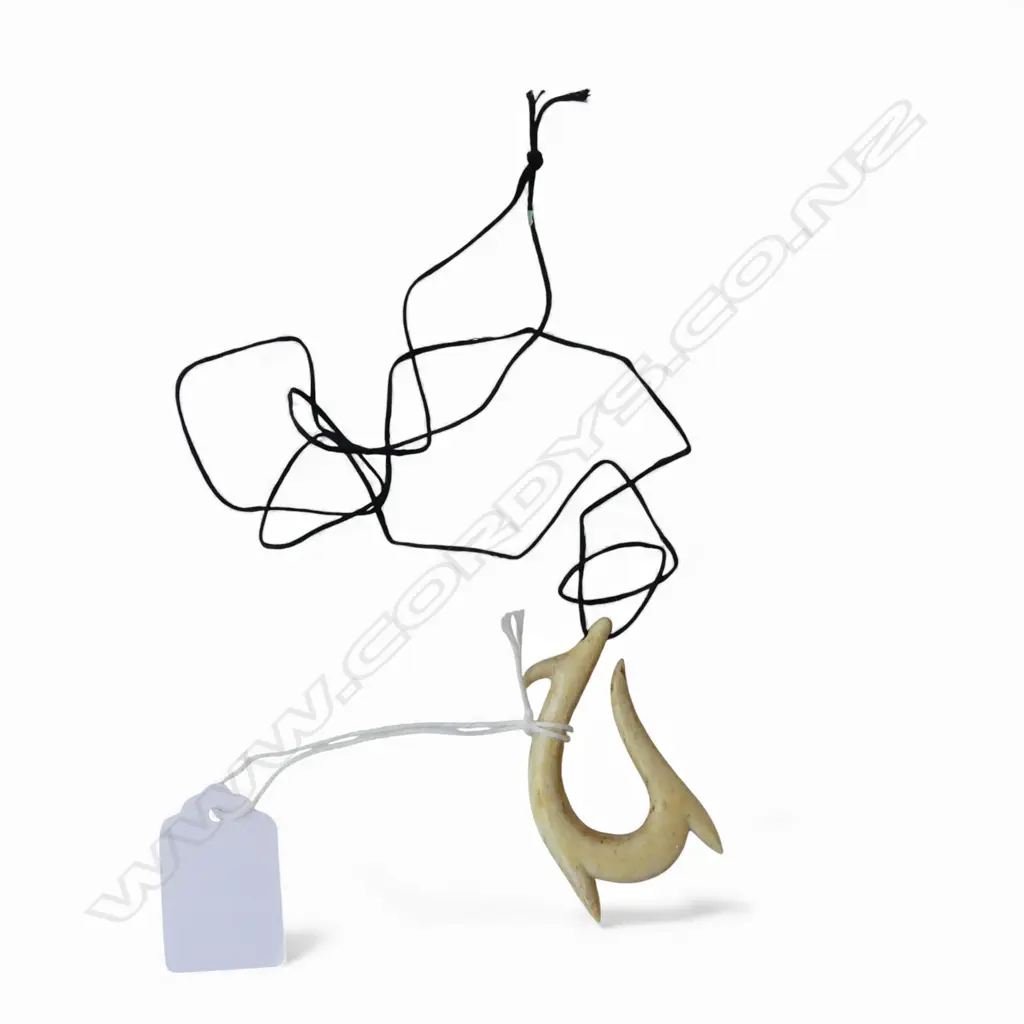 DAVID TUART CARVED WHALE BONE HEI MATAU pendant. L.58mm Image 1++