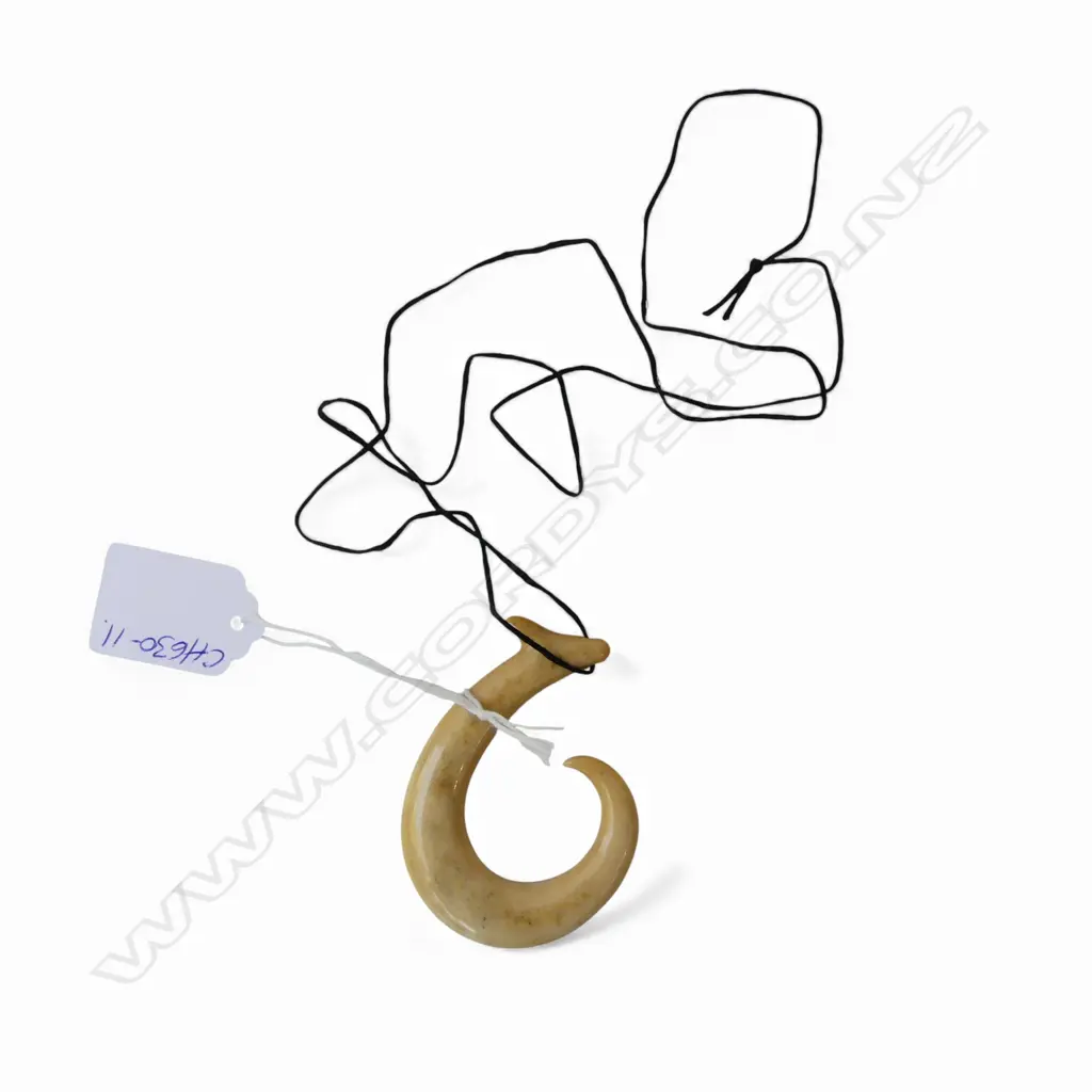 DAVID TUART CARVED WHALE BONE HEI MATAU pendant of good form & polish. 70 x 50mm Note: David Tuart (1936-2019) Image 1++