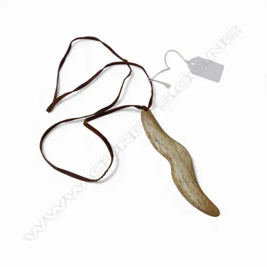 DAVID TUART CARVED WHALE BONE wavy SHAPED PENDANT. L.110mm