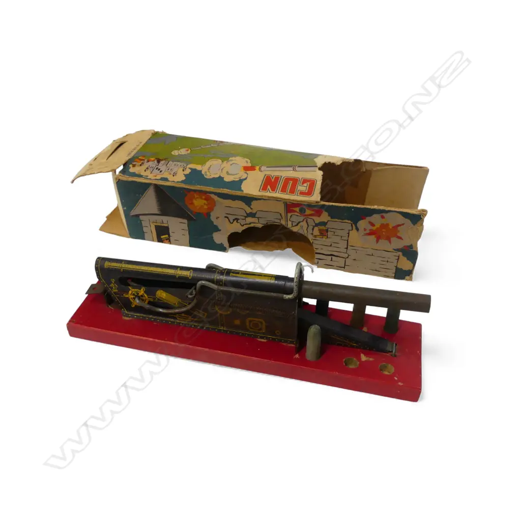 VINTAGE TINPLATE 'MODEL H.83 SEIGE GUN' on red painted wooden base L.33cm 6 bullets (2 missing) in original faulted box  Image 1++