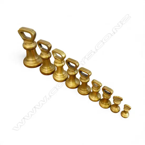 SET OF 9 VICTORIAN BRASS BELL FORM WEIGHTS. From 1000 Sovereigns to 8oz.