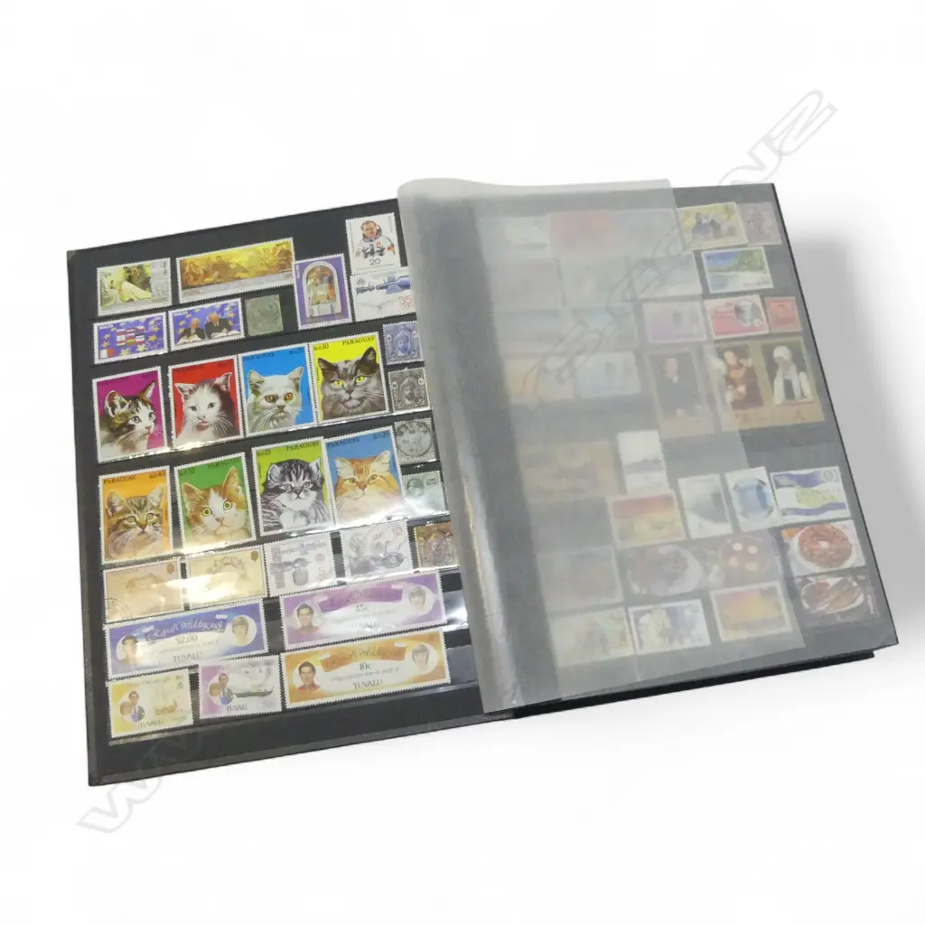 ALBUM OF ASST. WORLD STAMPS Image 1++