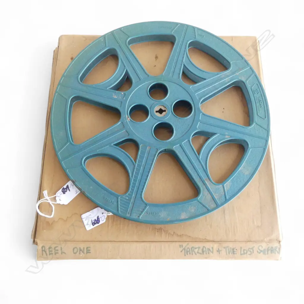 TWO ORIGINAL 16MM MOVIE REELS, 'TARZAN AND THE LOST SAFARI ' REEL ONE AND REEL TWO WITH TAKE UP REEL  Image 1++