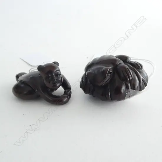 TWO ROSEWOOD NETSUKE; FROG on LOTUS LEAF & CRAWLING BABY