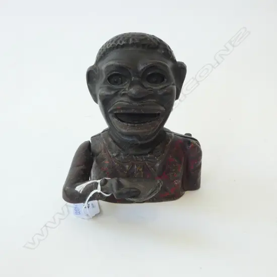 ANTIQUE CAST IRON FIGURAL MONEY BOX w. RED JACKET H.160mm