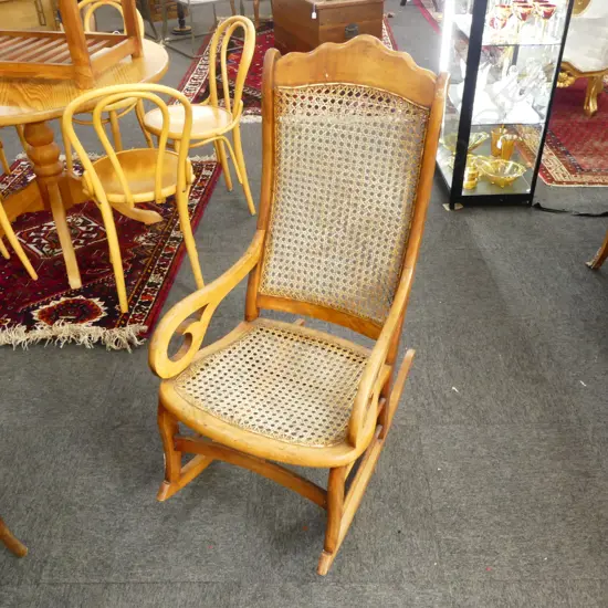 CANED WOODEN ROCKING CHAIR