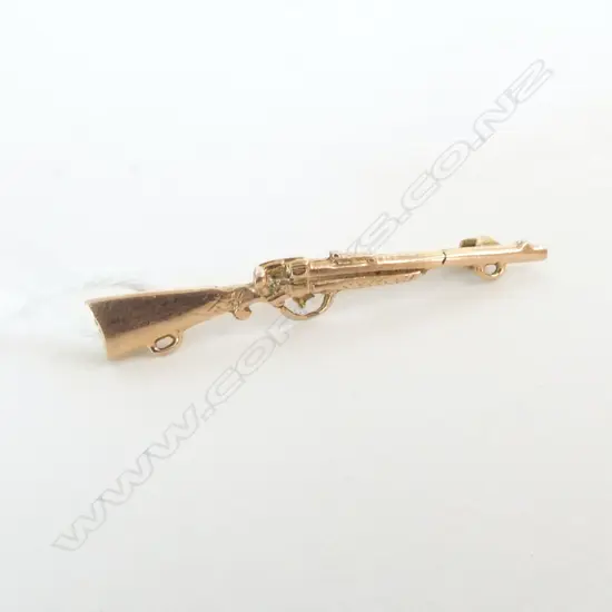 VINTAGE 9ct GOLD RIFLE BROOCH by P & L. 1.55gms L.35mm