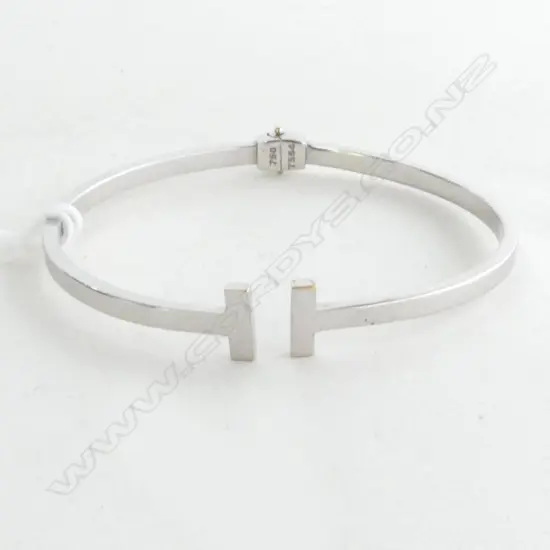 18ct WHITE GOLD SPRING BANGLE, Dia.50mm, 6.8gm (sml size) (TIFFANY T554)