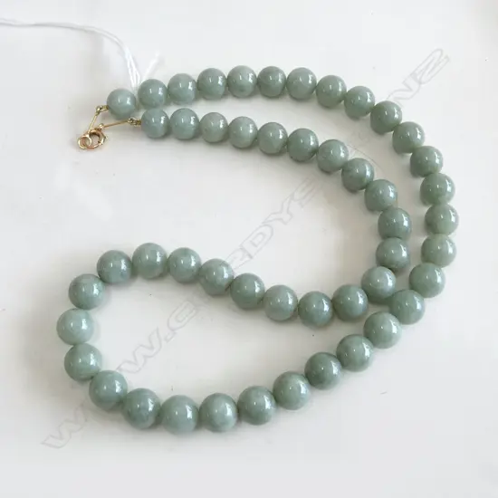 STRING OF JADE BEADS