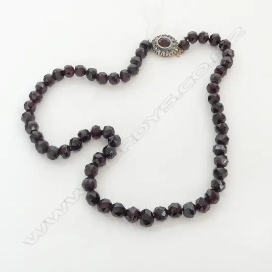 ANTIQUE FACET CUT GARNET NECKLACE with gem set silver gilt clasp. L.400mm