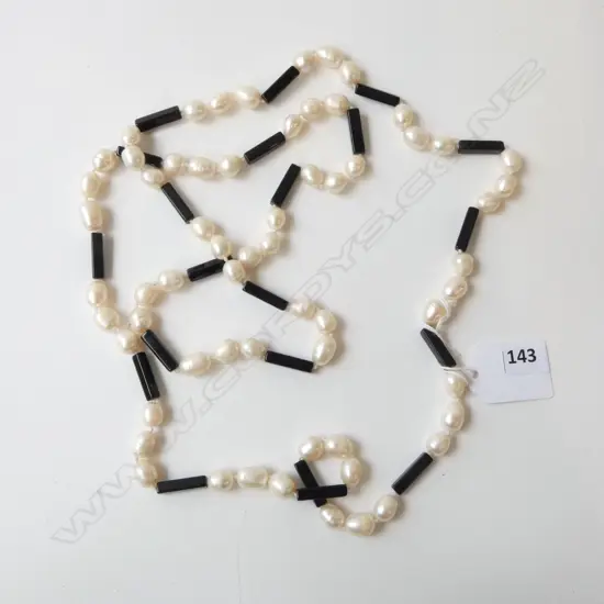 LONG FRESH WATER PEARLS with black spacers 