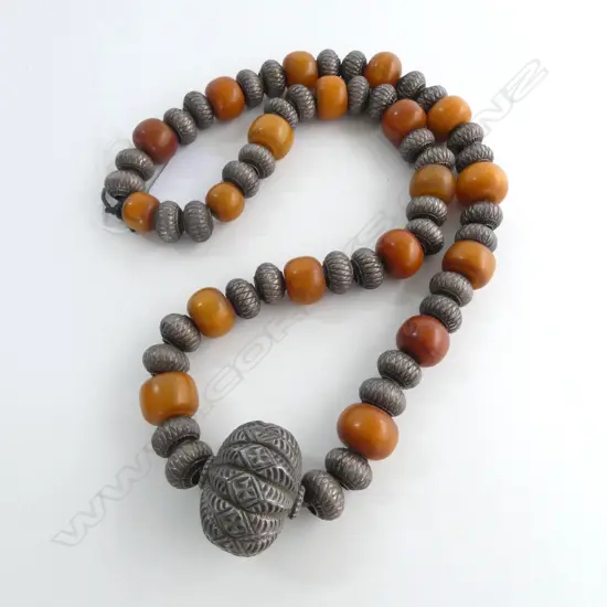 CHUNKY TRIBAL NECKLACE with faux amber beads + decorative silver ? beads. 