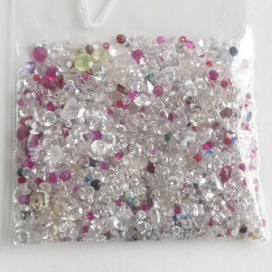 LARGE BAG OF JEWELLERY GEMS 354cts white sapphires + CZ's etc