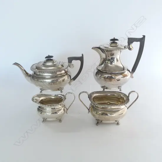SILVER 4 PCE TEA SET: tea pot. Hot water pot. sugar & cream Sheffield 1959. 2094gms