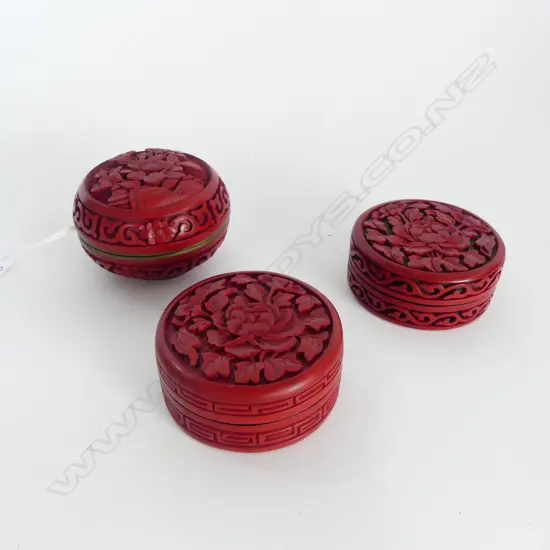 3 CINNABAR TRINKET BOXES; 1 w. enamel interior. H.50mm