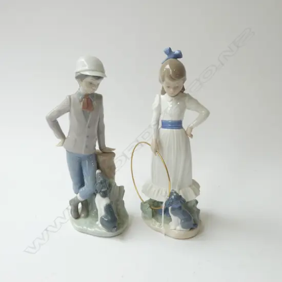 2 NAO FIGURINES; GIRL w. HOOP, BOY w. DOG H.235mm...