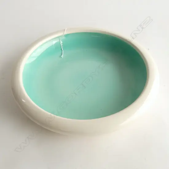 O.C. STEPHENS SHALLOW BOWL; Ivory glaze, internal turqoise glaze, star crack to base, dia.290mm