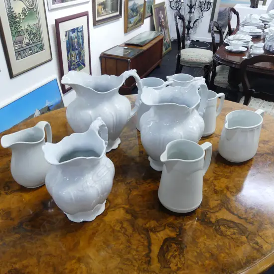 9 ANTIQUE WHITE JUGS H.280mm IRONSTONE ETC