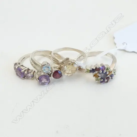 FOUR SILVER & SEMI PRECIOUS STONE RINGS