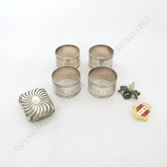 4 SILVER PLATED? NAPKIN RINGS (numbered 1-4), S/PLATED VICTORIAN VESTA CASE & 2 BADGES