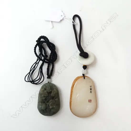 2  ORIENTAL CARVED JADE PENDANTS