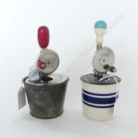 2 VINTAGE TOY ROTARY BEATERS ON MEASURES; H.165mm, 1 w. LID