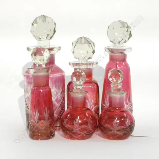 6 COLOURED GLASS SCENT BOTTLES H.160mm
