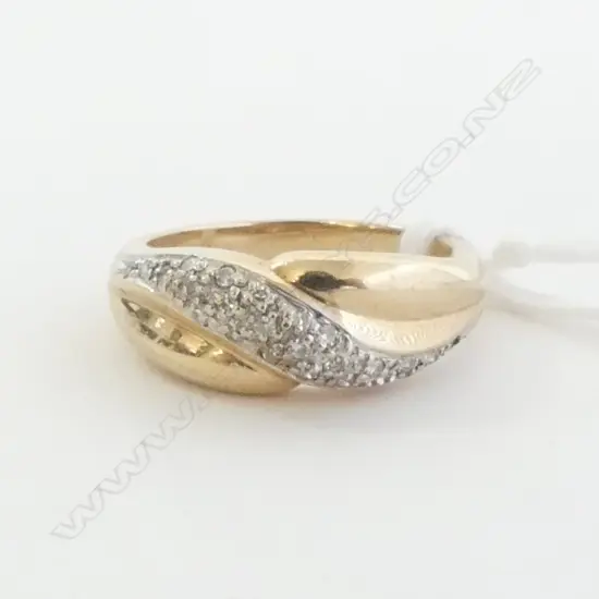 9ct GOLD PAVE SET DIAMOND RING 4.82gms (diamond missing) size N