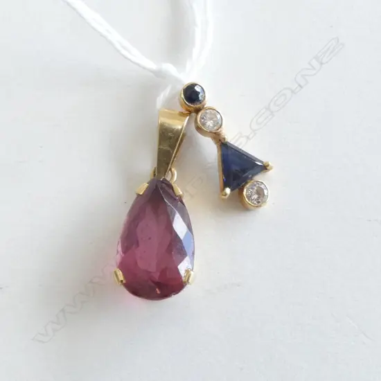 TWO 18CT GOLD AND GEMSTONE PENDANTS 3.13gms