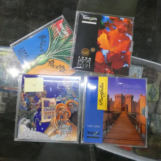 GROUP OF 4 PHONE CARD COLLECTION