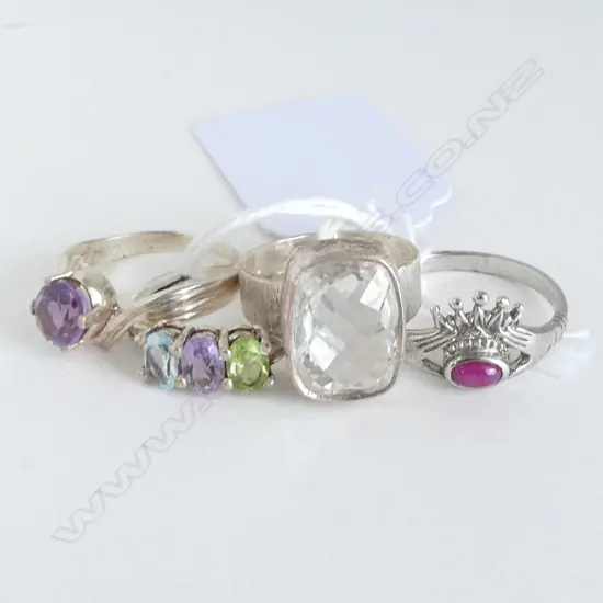 FOUR SILVER & GEMSTONE RINGS