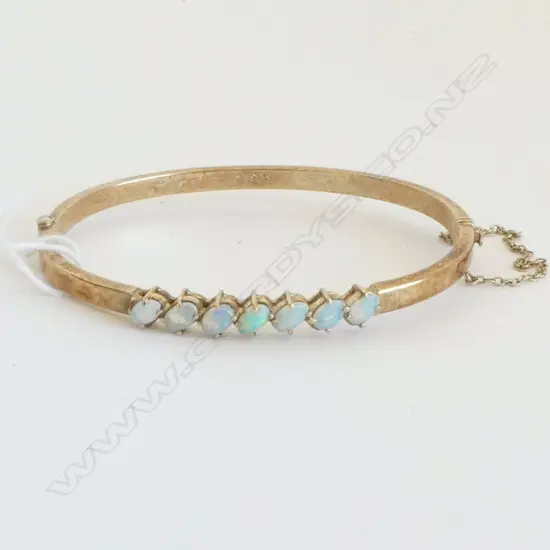SILVER GILT & 7 OPAL HINGED BANGLE
