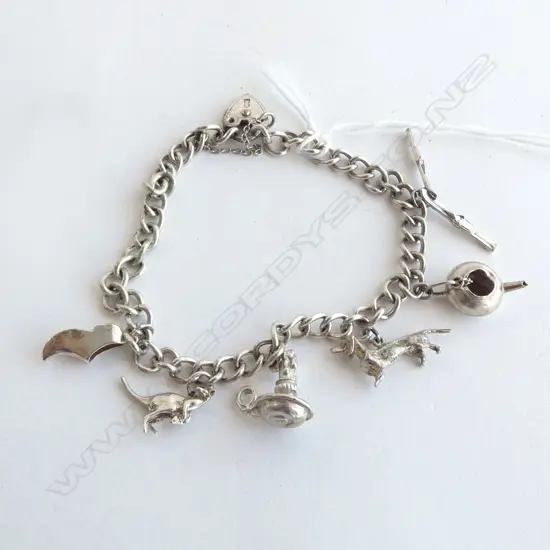 SILVER CHARM BRACELET, 24.6gm