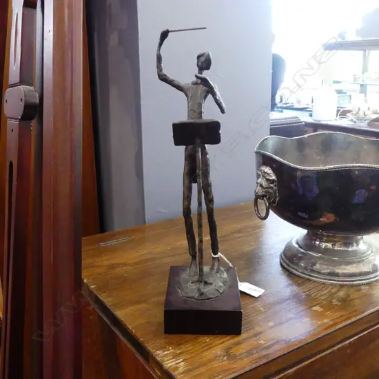 BRONZE CONDUCTOR SIGNED 'KIM B?' H.330mm
