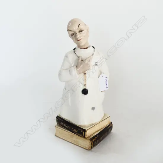 CERAMIC 'ENGLISH LAW INTERNATIONAL LAW' MUSICAL DECANTER AS A DOCTOR H.270mm