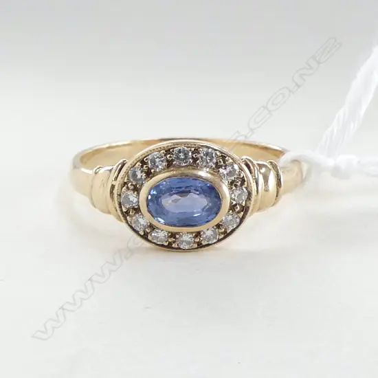 9CT GOLD CORNFLOWER BLUE SAPPHIRE AND DIAMOND RING 2.48gm SIZE P