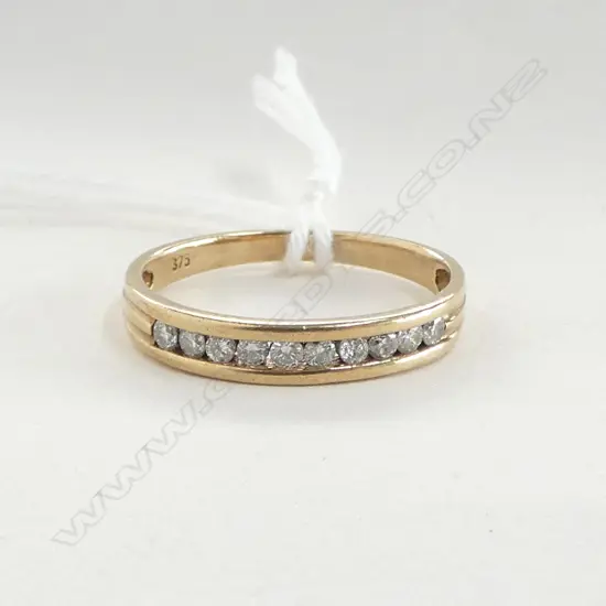 9CT Y/GOLD DIAMOND CHANNEL SET BAND 1.72gm SIZE O