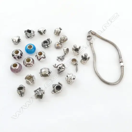SILVER BRACELET with 22 SILVER CHARMS many decorated & of novelty forms.