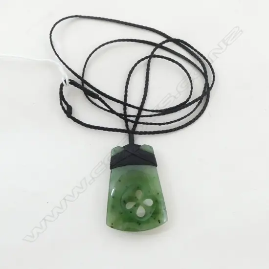 POUNAMU PENDANT toki form with carved cross-over design on plaited cord necklace