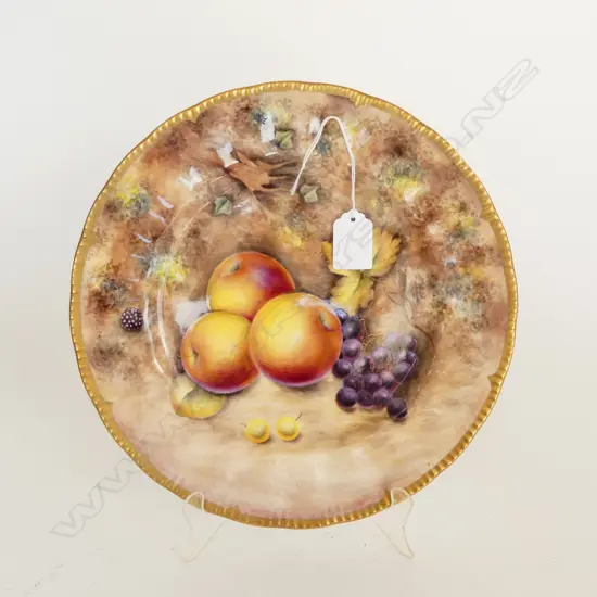 A fruit painted plate by Gerald Delaney