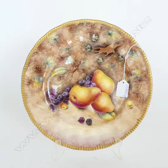 A fruit painted plate by Gerald Delaney