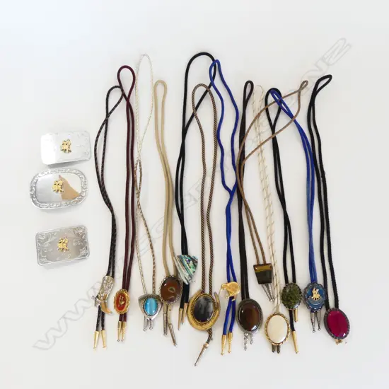 COLLECTION OF COWBOY BELT BUCKLES & PENDANTS