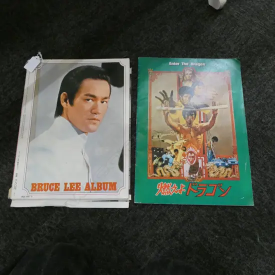 2 Original Bruce Lee magazines, 1 w/ posters, 2 or 3 pages have cutouts missing