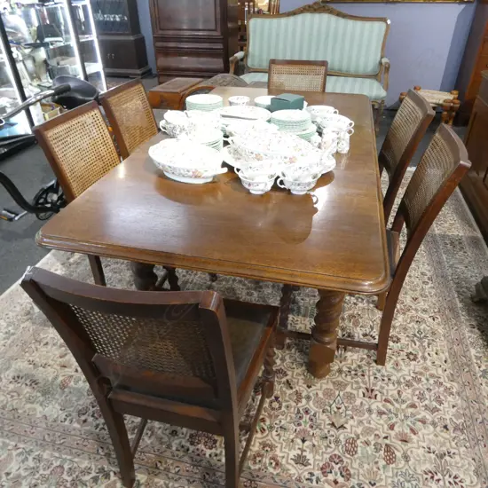 OAK BARLEY TWIST TABLE & 6 CANE BACK CHAIRS