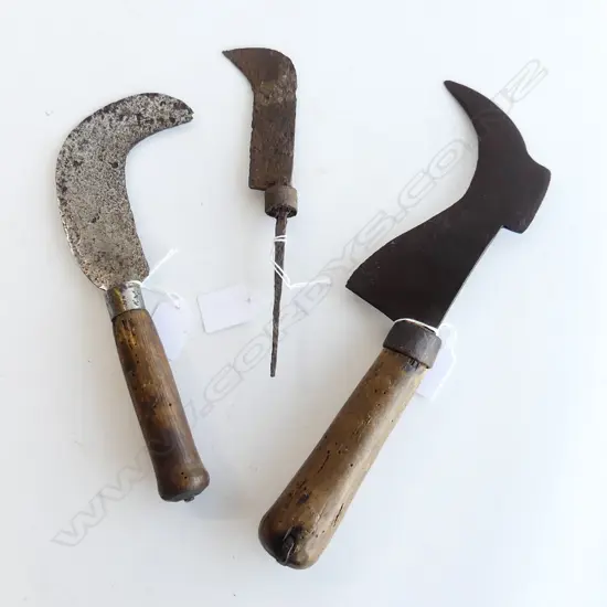 Three old hook pruning knives,